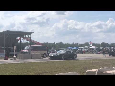 Corvette Z06 vs built Astrovan in a drag race