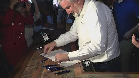 Governor Holcomb signs law bringing back 'happy hour' to Indiana