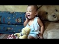 Cute baby boy talking on cell phone