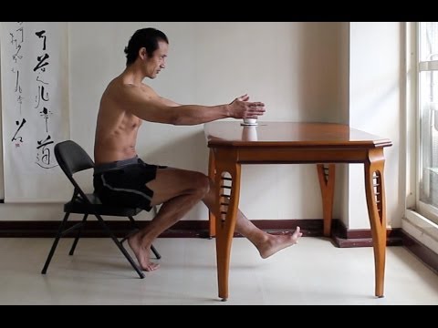 squatting and single leg squatting from a chair yoga desk exercises