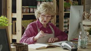 Cashier Counts Money | Copyright Free Video Footage