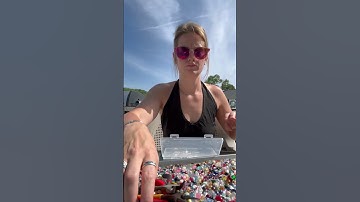 Woman shows the process of making a chicken wire window with mixed beads!
