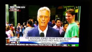Man acts goofy behind Fox News reporter John Robert s on live TV
