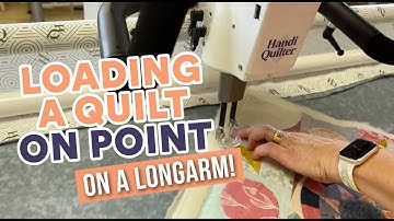 Loading A Quilt On Point on a Longarm