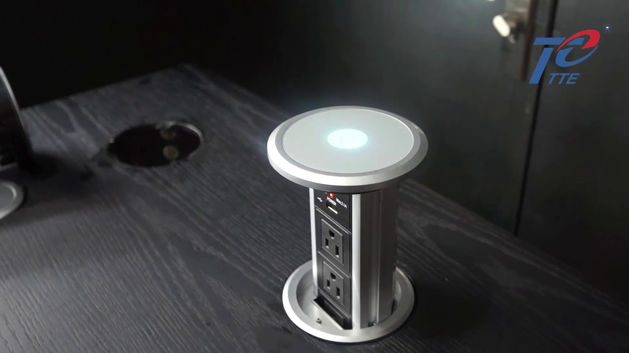 Motorised pop up socket