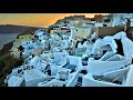 OIA SANTORINI - Breathtaking views of cliff hanging town on the volcano in Aegean Sea - Greece