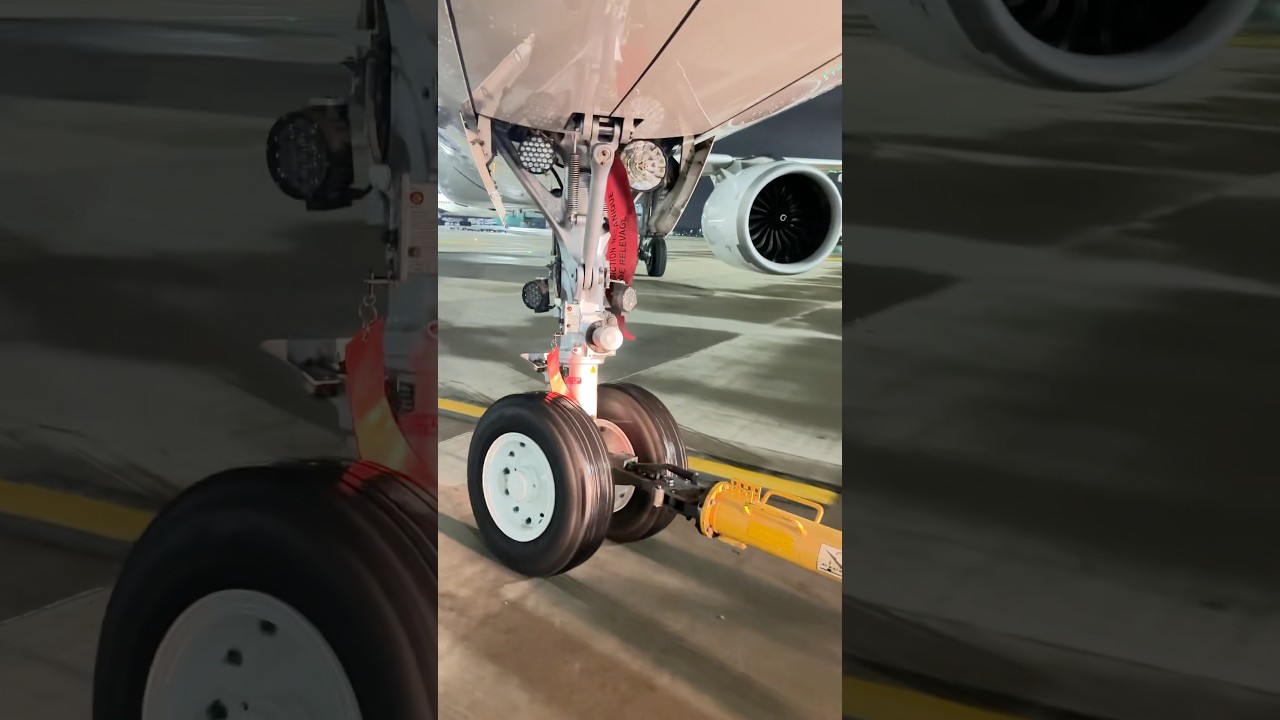 Aircraft pushback by tow truck. 