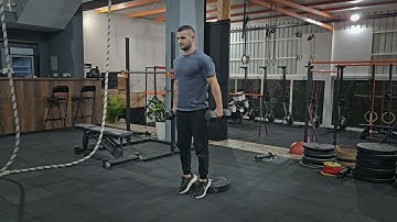 How to do a Dual Arm Dumbbell Suitcase Cyclist Squat