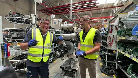 Exclusive Wacker Neuson Linz factory tour with EW100 compact wheeled excavator specialist Andreas