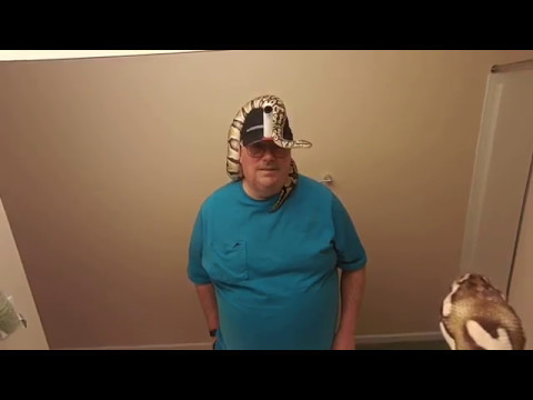 Electra ball python exploring my ball cap camera