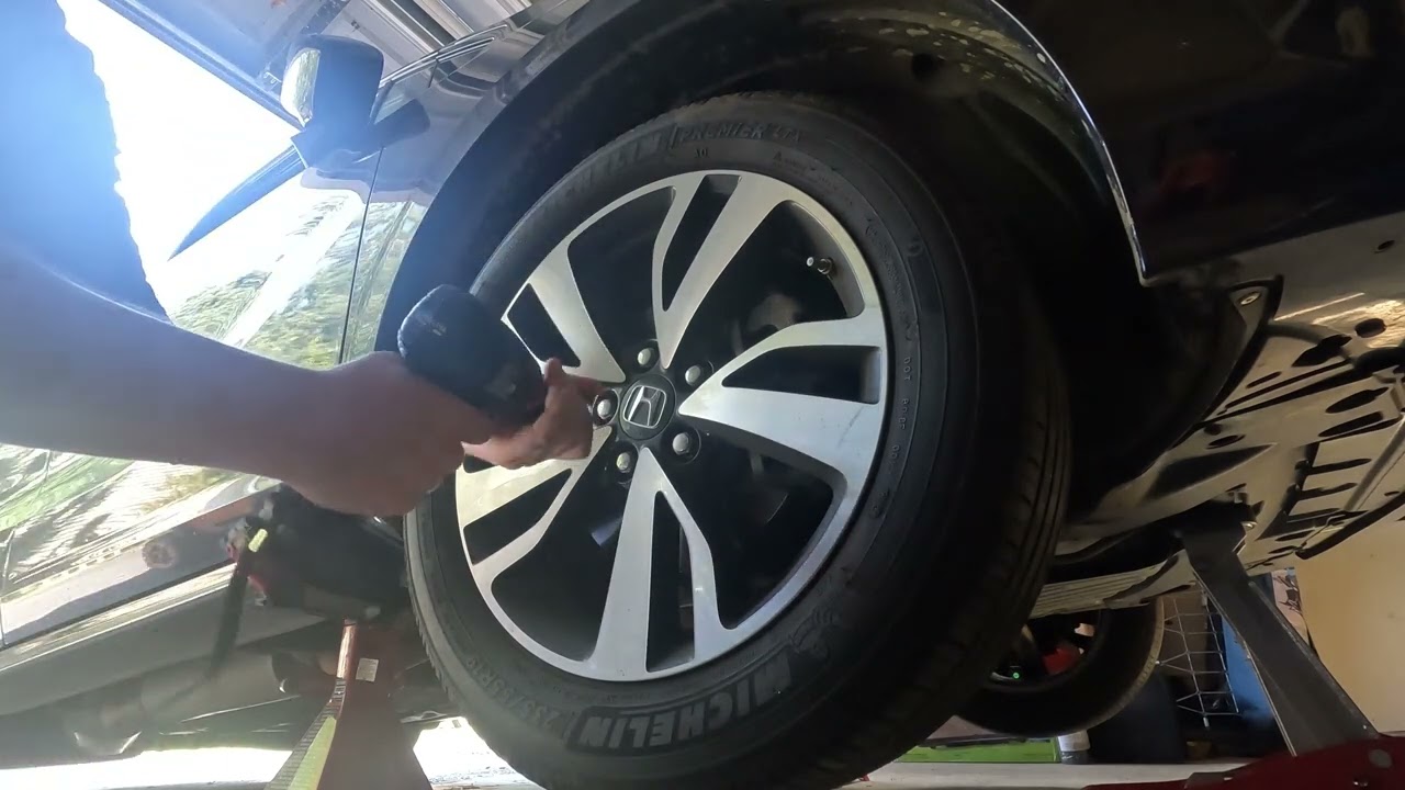 Testing a Brand New Bosch Impact Wrench Removing a Tire on a Honda Odyssey.