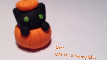 DIY polymer clay charms: 13 days of Halloween: day 4 black cat in pumpkin