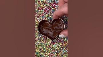 Thumbnail of How to make chocolate hearts with colorful sprinkles #heart #chocolate #sprinkles