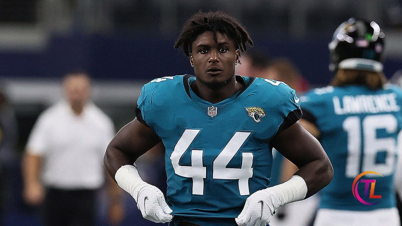 Former NFL standout climbed out of second-story window, fell before facing gun charges, police say