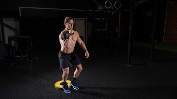 Single Arm KB Front Rack Cyclist Squat