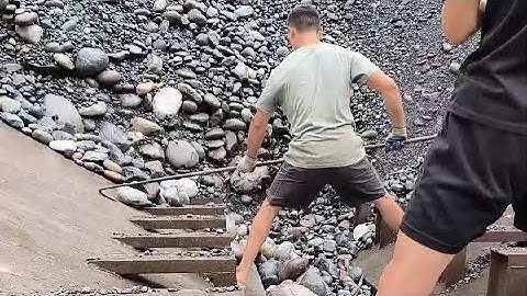 Barge unloading cobblestone - my daily work on the barge