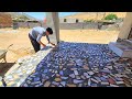 "Decorating and beautifying the front porch with broken tiles by Abu and Ali"