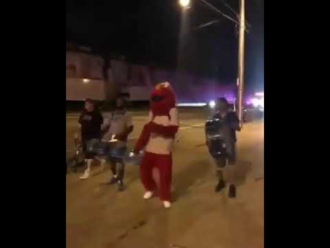 elmo-dancing-next-to-big-fire