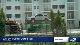 Unusual Sight: Car found parked on top of dumpster in Fort Myers