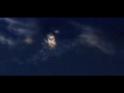 MASSIVE Golden UFO Orbiting EARTH.