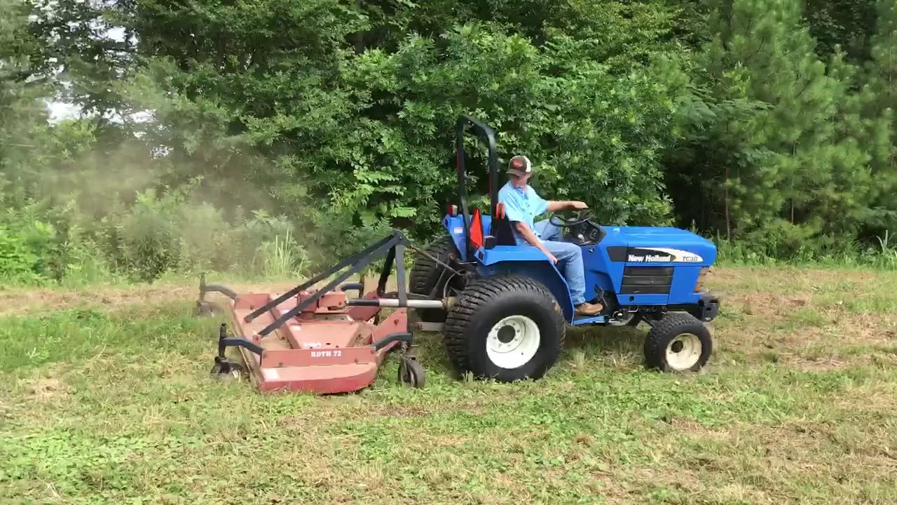 nh-tc30-and-rhino-mower-youtube