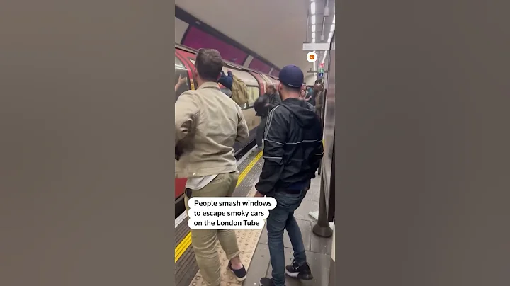 Passengers escape smoky London Tube cars at Clapham Common station