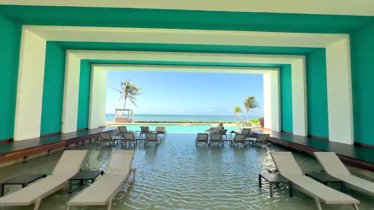 Oceanfront resort pool, the setting for a Destination Wellness experience