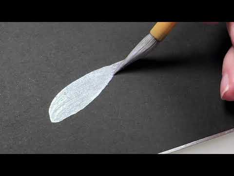 Silver Liquid Metallic Sumi Ink - swatch on black paper