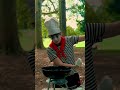 Mime chef lights a charcoal grill