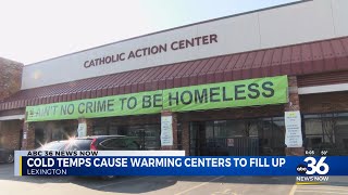 Colder temperatures cause warming centers to fill up