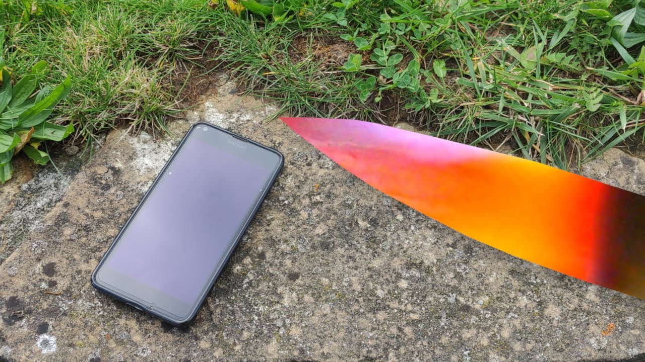 PHONE CUT WITH A GLOWING 1000 DEGREE KNIFE! - Experiment