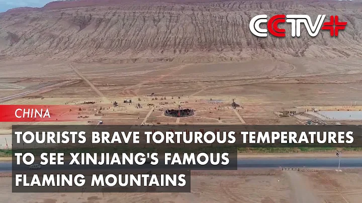 Tourists Brave Torturous Temperatures to See Xinjiang's Famous Flaming Mountains - DayDayNews