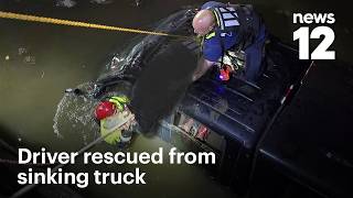 Dramatic footage shows driver rescued from truck sinking in icy Hackensack River | News 12