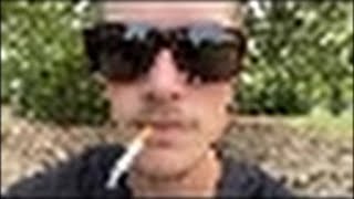 Smoking a Cigarette in 36p Quality