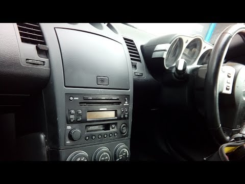 Nissan 350Z how to remove factory radio,simple quick guide + part numbers