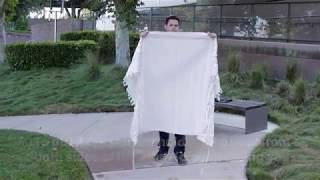 How to put on a tallit