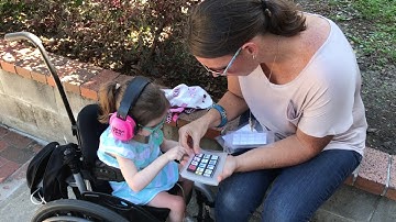Harper and Mom chatting with PODD