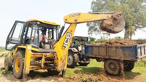 JCB_3DX Loading Mud In EICHER 380 DI Tractor Loaded