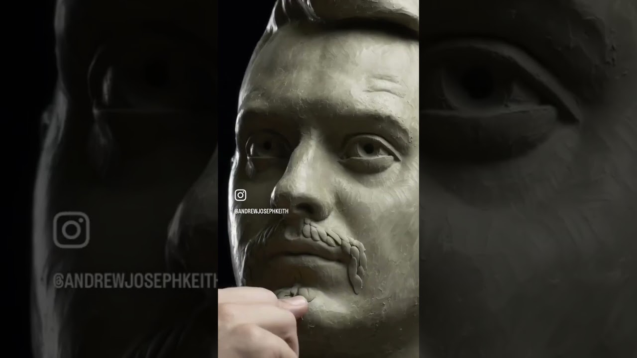 Sculpting the facial hair of this self portrait in clay.