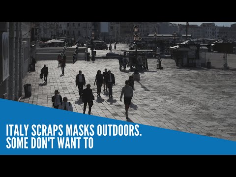 Italy scraps masks outdoors, but some don't want to