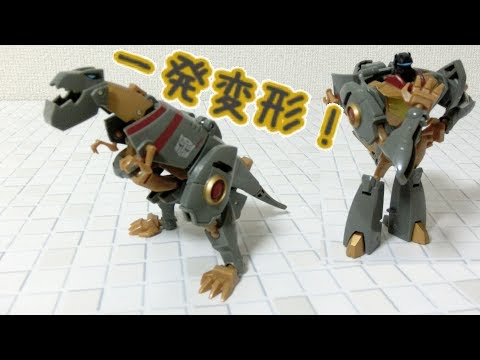 A dinosaur instantly transforms into a robot! Grimlock