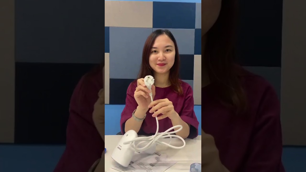 Unbox bàn ủi hơi nước cầm tay Philips STH1000/10 - Nhỏ gọn đa năng