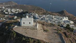 Church On Top Of The Hill With Greek Flag Waving In Wind Aerial Perspective