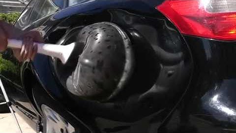 Using boiling water and a plunger to make car dents