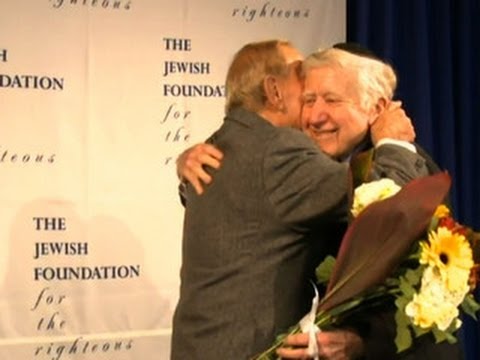 Holocaust survivor reunites with man whose family hid him - YouTube