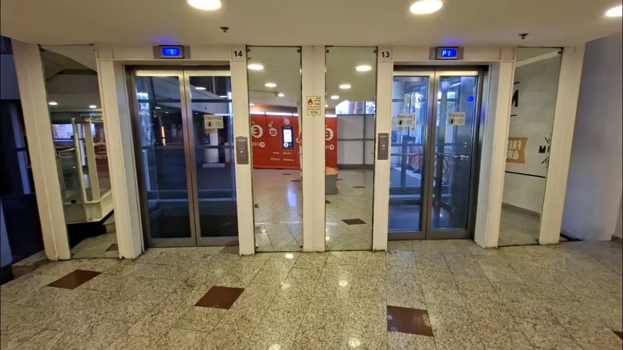 2 прозрачных лифта OTIS Gen2 2015 года 1275кг 17 пассажиров @ ТЦ Азриэли Хайфа, Хайфа, Израиль