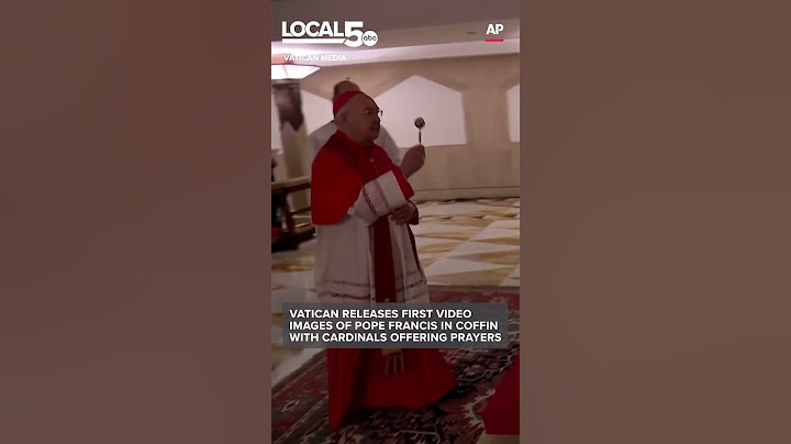 First video images of Pope Francis in coffin with cardinals offering prayers