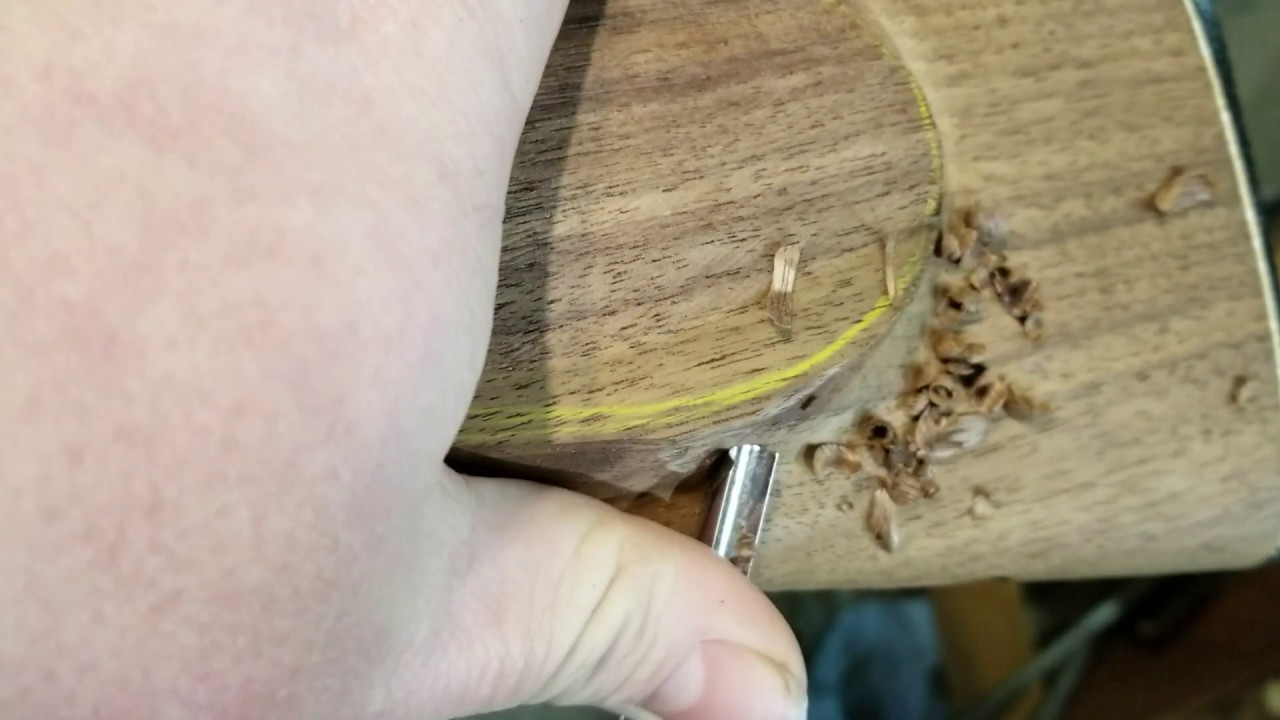 Reshaping a pre-carve stock ~ cheek piece.