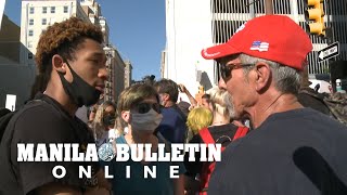 Pro and anti Trump protesters face off outside rally venue in Tulsa