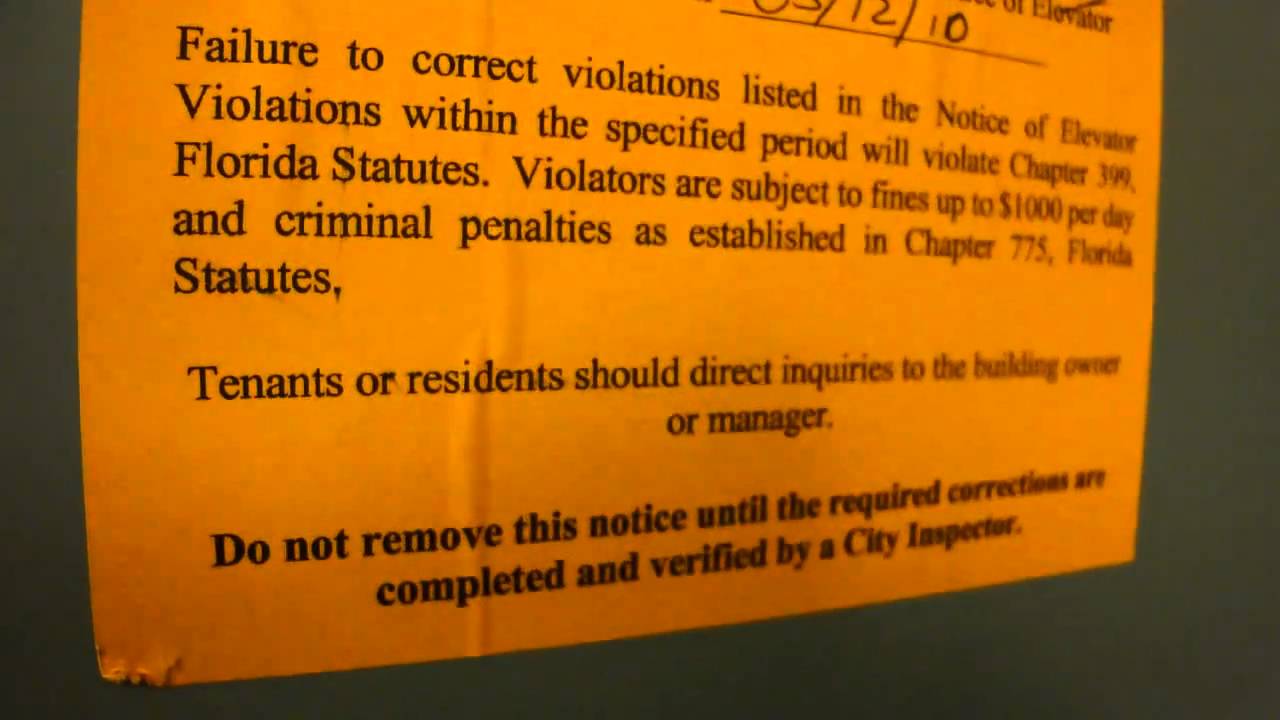 Unknown Traction Elevator with Code Violations at an Office in South